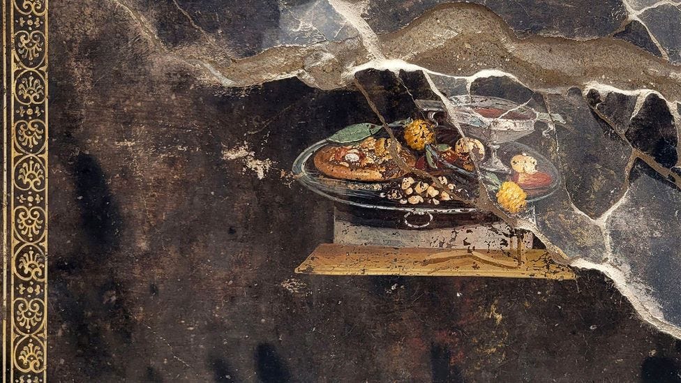 A recently discovered fresco of a flatbread at Pompeii (Credit: Abaca Press/Alamy)